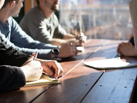 people in front of a table