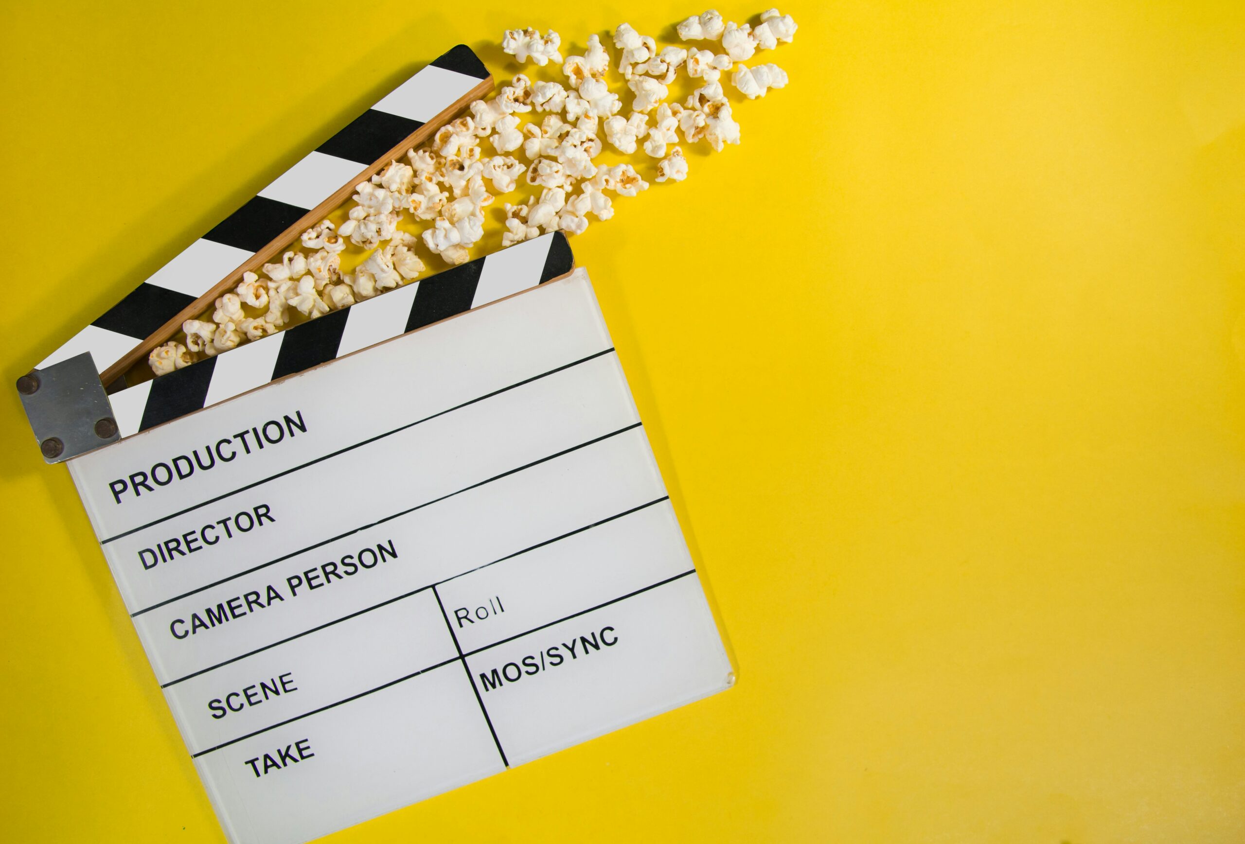 A clapperboard, a dumb slate, clapboard, film clapper, film slate, movie slate, or production slate,