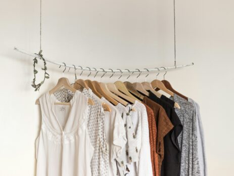 Assorted clothes On Wooden Hangers