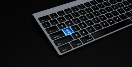 A KEYBOARD WITH THE BUTTON WRITE AI